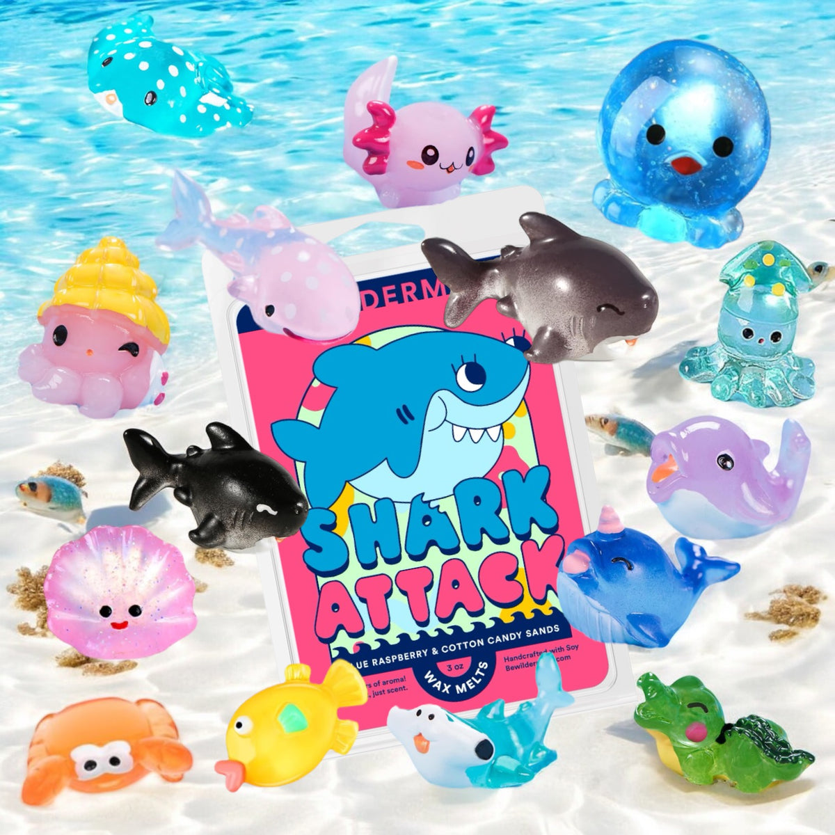 Colorful wax melts shaped like various cute sea creatures including sharks, dolphins, octopuses, and whales around a Shark.
